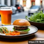 Home 17 전통 발효식품의 현대적 요리 기법 소개 - A modern French bistro table setting featuring a gourmet burger with homemade kimchi and artisan sou...